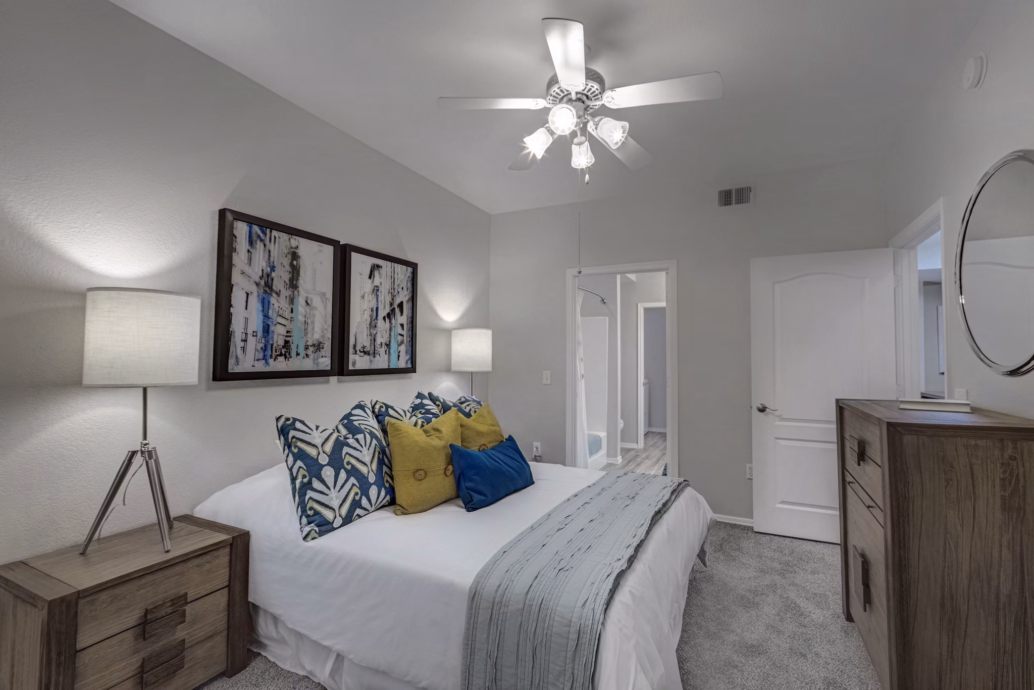 Cozy bedroom with large windows at Springs at Continental Ranch Apartments