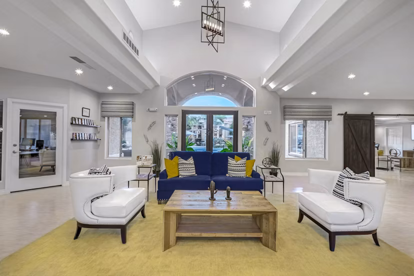 Clubhouse featuring modern design and leisure spaces at Springs at Continental Ranch Apartments