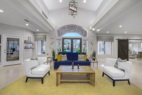 Clubhouse featuring modern design and leisure spaces at Springs at Continental Ranch Apartments