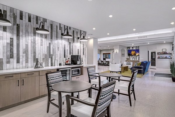 Stylish clubhouse interior with modern furnishings at Springs at Continental Ranch Apartments
