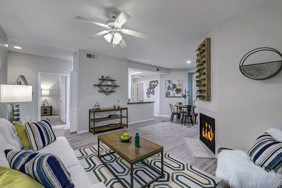 Living room featuring modern decor and ample natural light at Springs at Continental Ranch Apartments