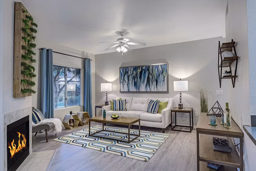 Spacious living room with modern decor at Springs at Continental Ranch Apartments