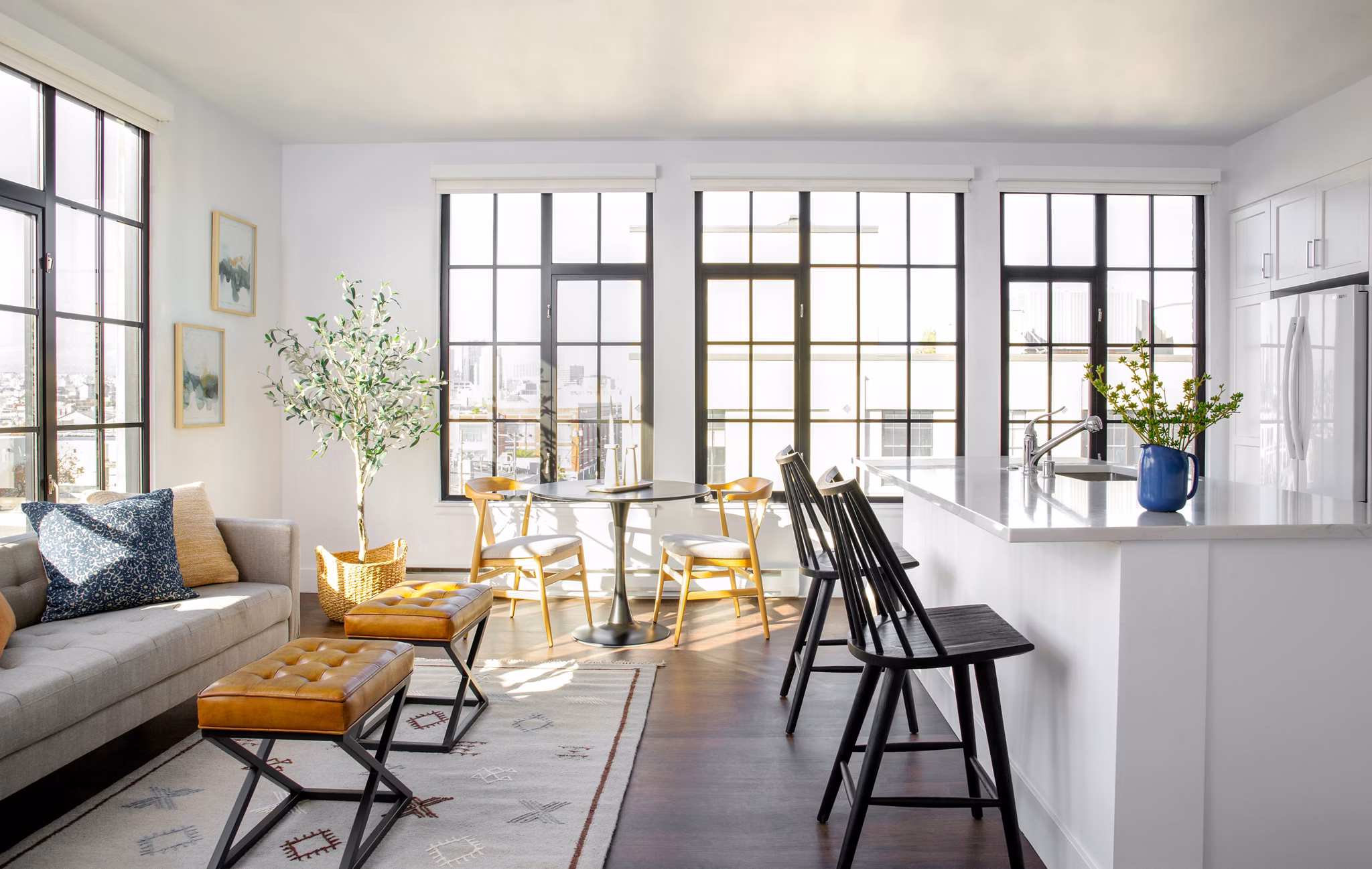 Dining area featuring modern design and elegant lighting at The Madelon Apartments