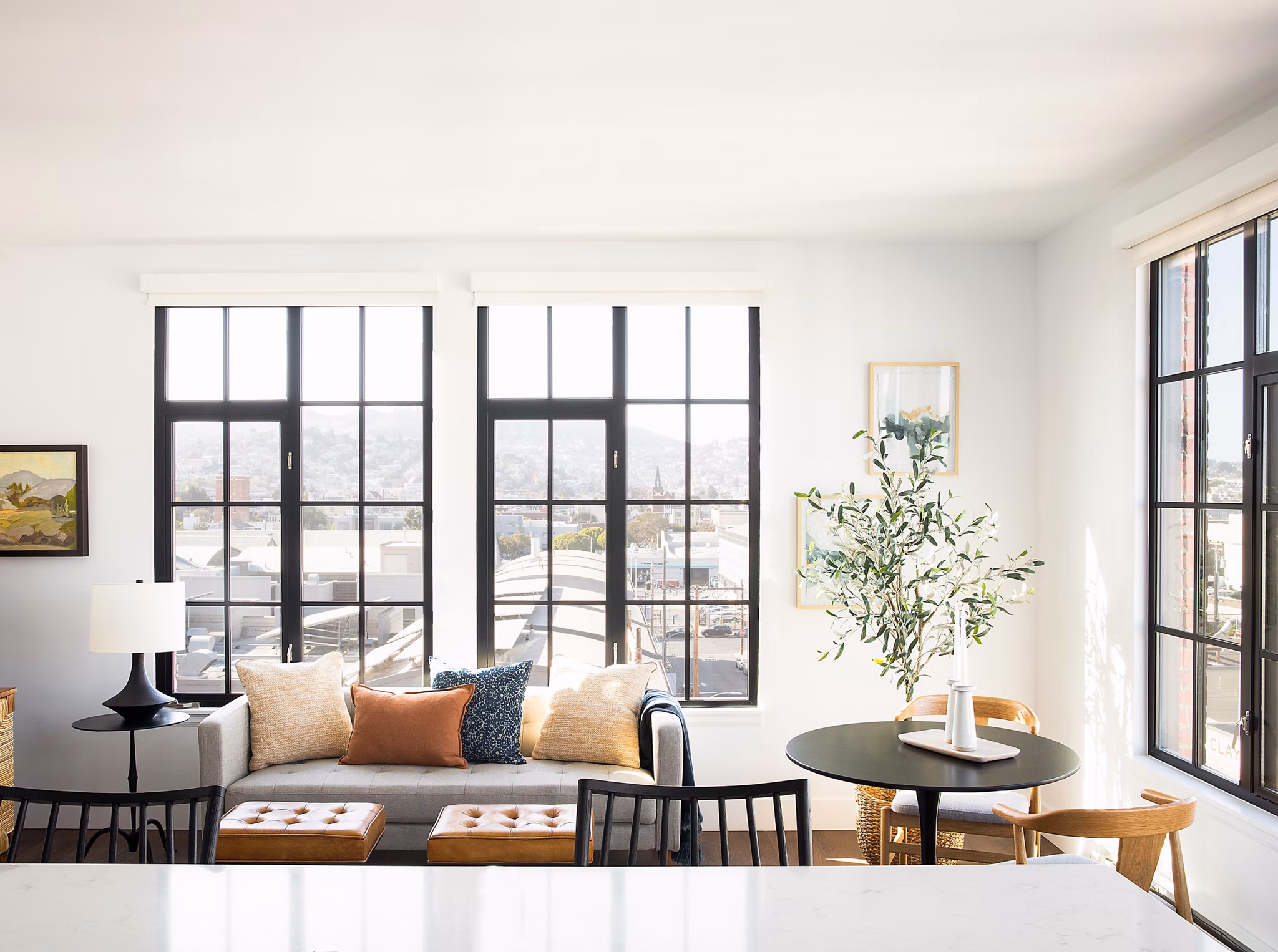 Spacious living room with modern decor at The Madelon Apartments, luxury residences by Greystar