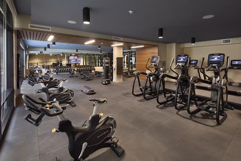 Modern fitness center with state-of-the-art equipment at Lynhaven Apartments for luxury living