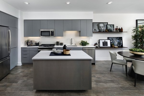 Modern kitchen featuring stainless steel appliances at Lynhaven Apartments, a luxury community by Greystar