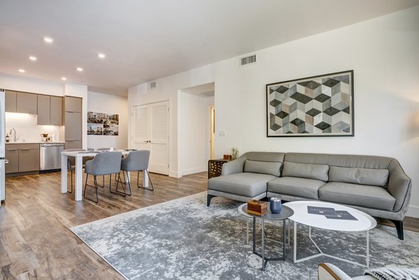 Spacious living room with modern design elements in Lynhaven Apartments