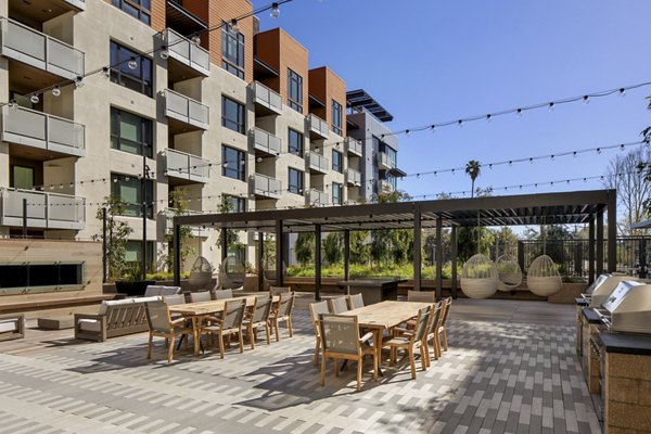 Courtyard view with landscaped gardens at Lynhaven Apartments, offering luxury living in a serene environment