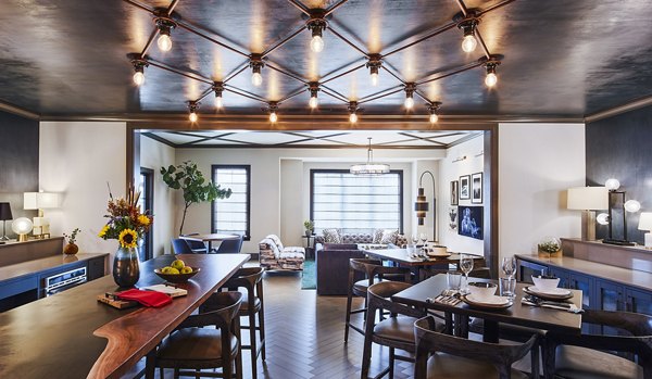 The Atworth at Mellody Farms: Spacious clubhouse with elegant seating and a cozy fireplace