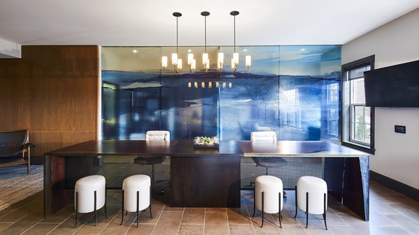 Modern clubhouse featuring upscale design at The Atworth at Mellody Farms Apartments, a luxury community with top amenities