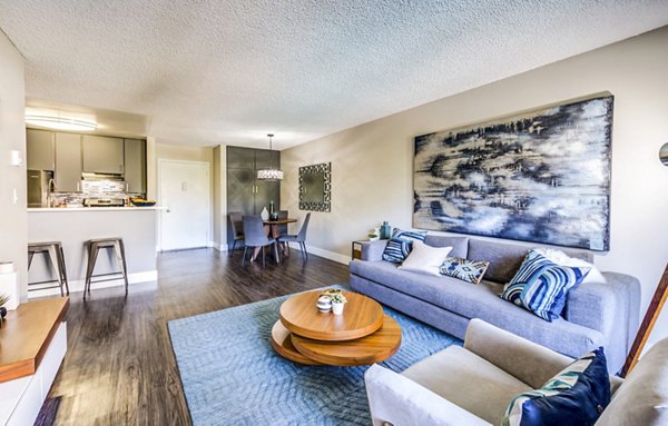 Contemporary living room with stylish furnishings at The Chadwick Apartments