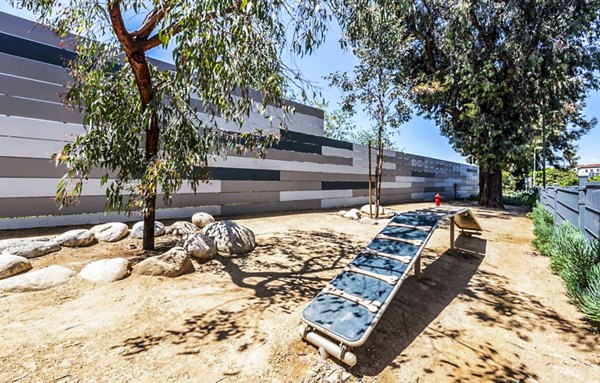 Dog-friendly area featuring spacious dog park at The Chadwick Apartments, a luxury community by Greystar