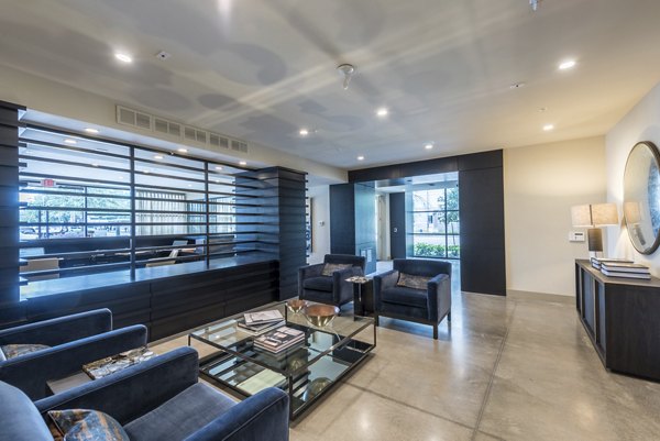 Modern clubhouse with sleek design elements at Eighteen25 Downtown Apartments, offering luxury social spaces for residents to relax and connect