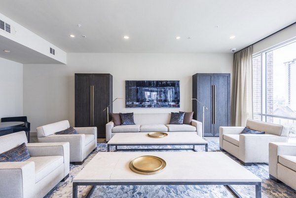 Clubhouse featuring modern design and social spaces at Eighteen25 Downtown Apartments