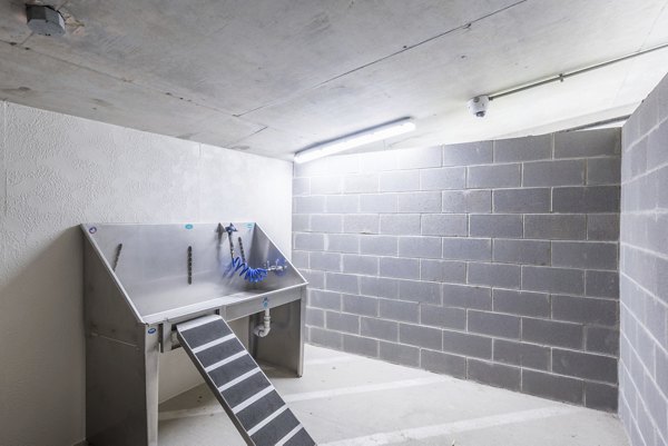 Dog wash station at Eighteen25 Downtown Apartments providing convenient pet care facilities for residents