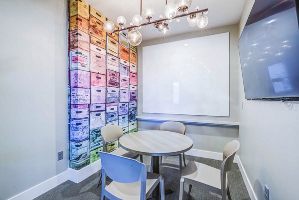 Clubhouse meeting facility with modern design at Union Blacksburg Apartments
