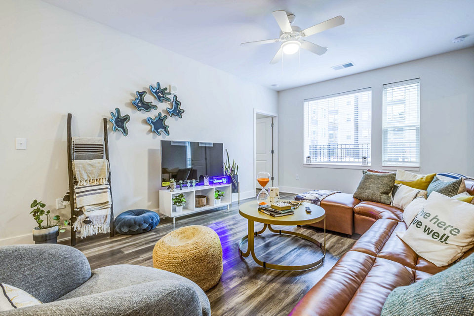 Cozy living room with modern furnishings at Union Blacksburg Apartments