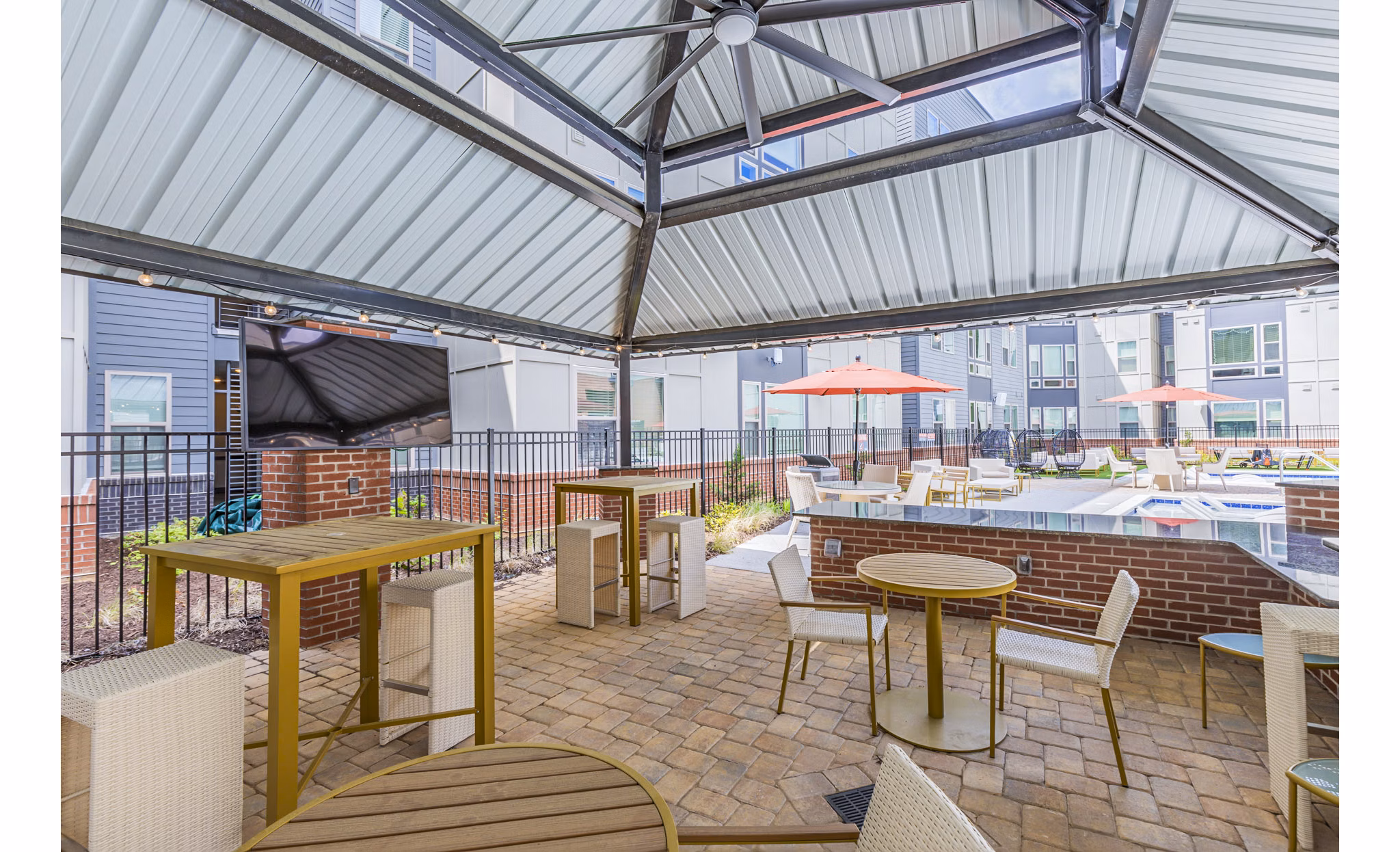 Outdoor patio with BBQ grill area at Union Blacksburg Apartments