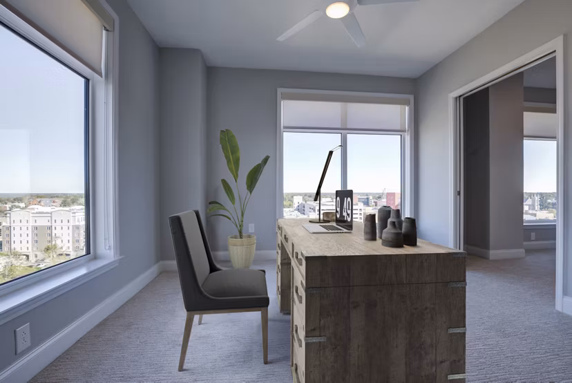 Cozy bedroom with modern decor and natural light in Overlook at River Place Apartments