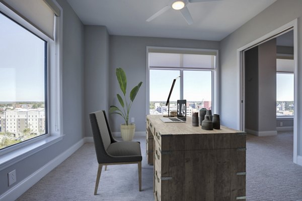Cozy bedroom with modern decor and natural light in Overlook at River Place Apartments