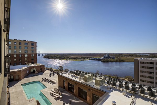 Overlook at River Place: Scenic view of luxury riverfront apartments in a serene setting