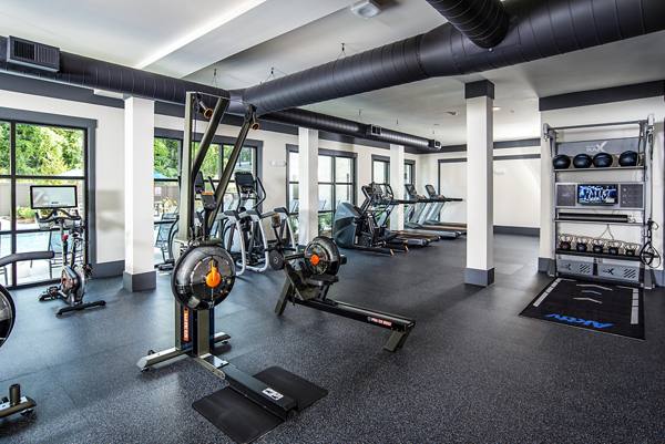 fitness center at One Riverside Apartments