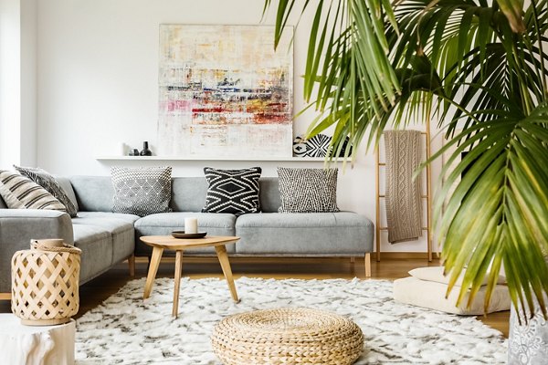 Spacious living room with contemporary decor at 22Hundred Apartments