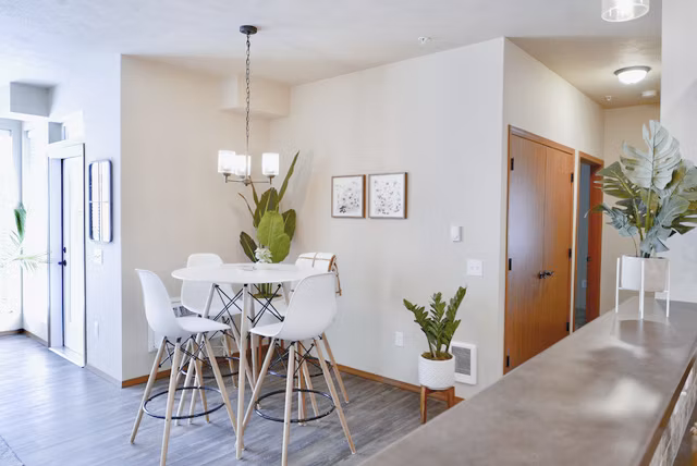 Elegant dining area with contemporary decor at Diamond Rock Rentals luxury apartments