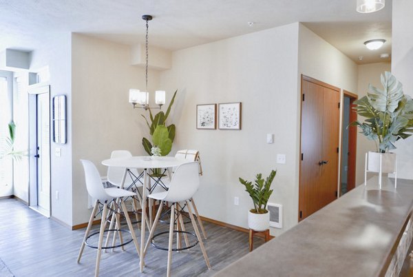 Elegant dining area with contemporary decor at Diamond Rock Rentals luxury apartments