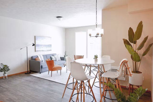 Dining area with modern decor and pendant lighting at Diamond Rock Rentals luxury apartments
