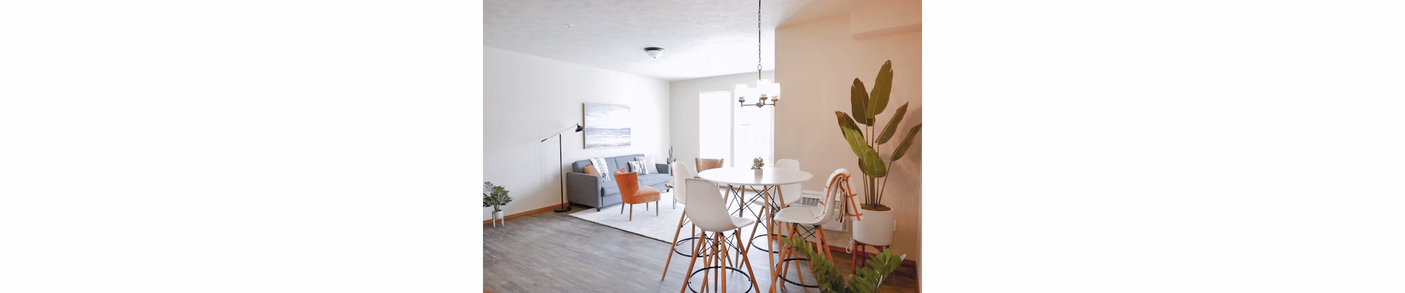 Dining area with modern decor and pendant lighting at Diamond Rock Rentals luxury apartments