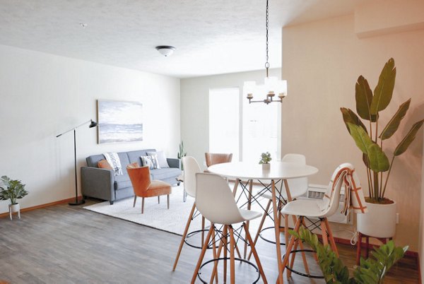 Dining area with modern decor and pendant lighting at Diamond Rock Rentals luxury apartments