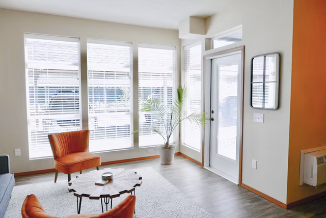Living room showcasing elegant decor and ample natural light in Diamond Rock Rentals