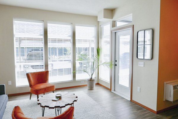 Living room showcasing elegant decor and ample natural light in Diamond Rock Rentals