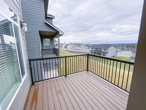 Cozy outdoor seating on a spacious patio at Diamond Rock Rentals luxury apartments