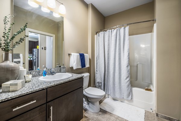 Modern bathroom with sleek fittings at Whetstone Apartments