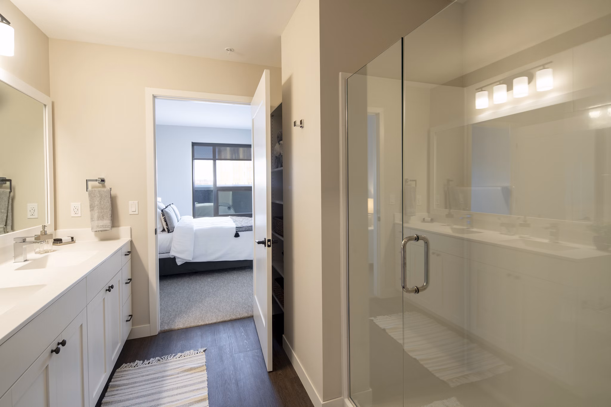 Luxurious bathroom featuring marble countertops and modern fixtures at The Berkman Apartments