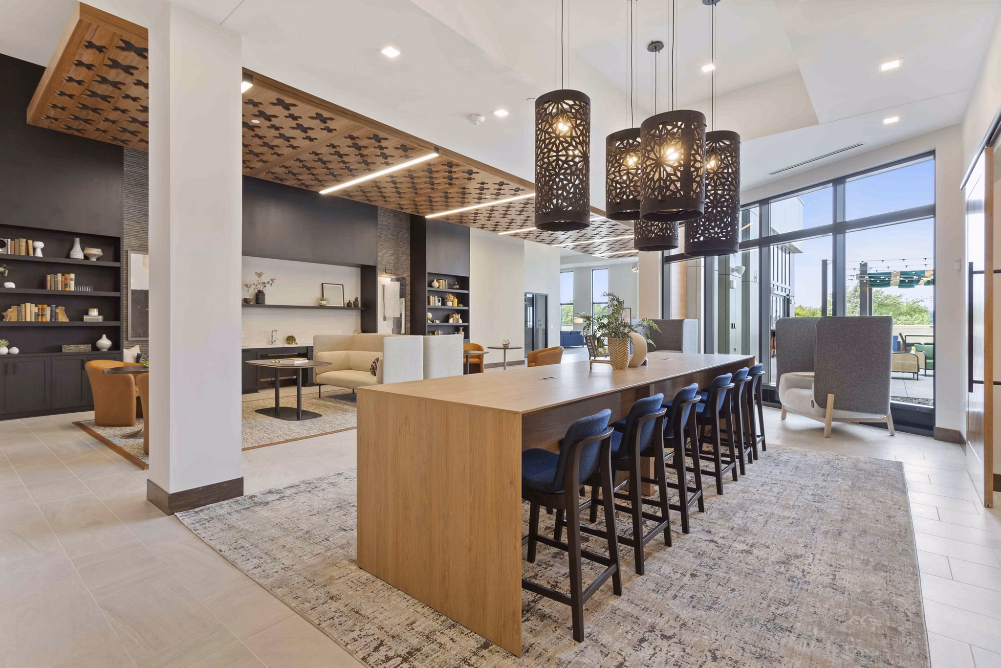 Modern clubhouse featuring elegant seating areas at The Berkman Apartments, perfect for socializing and events in a luxurious setting