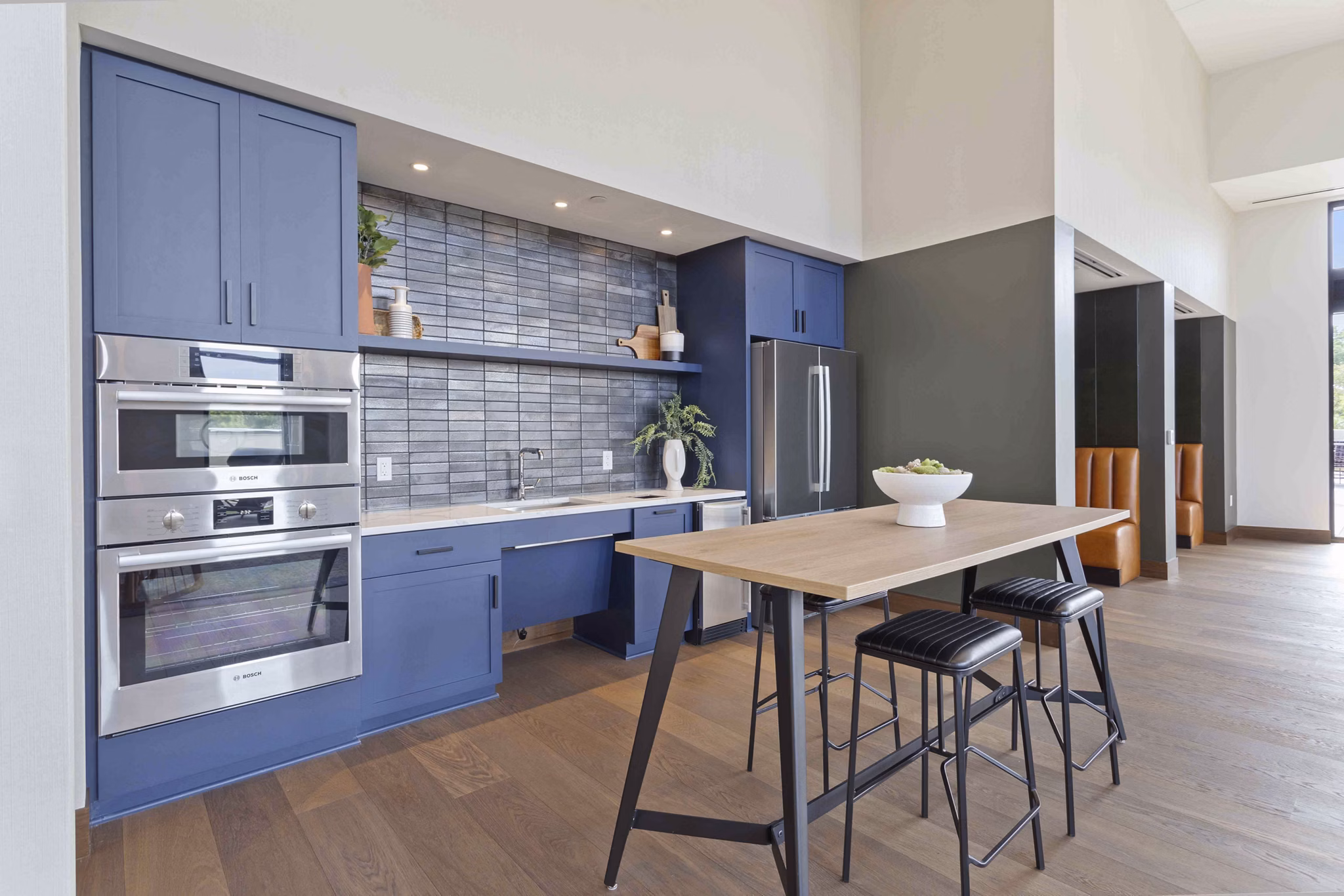 Luxurious clubhouse with modern furnishings at The Berkman Apartments in a vibrant urban setting