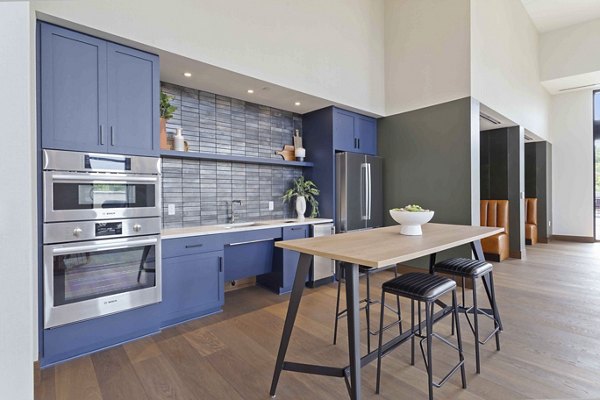 Luxurious clubhouse with modern furnishings at The Berkman Apartments in a vibrant urban setting