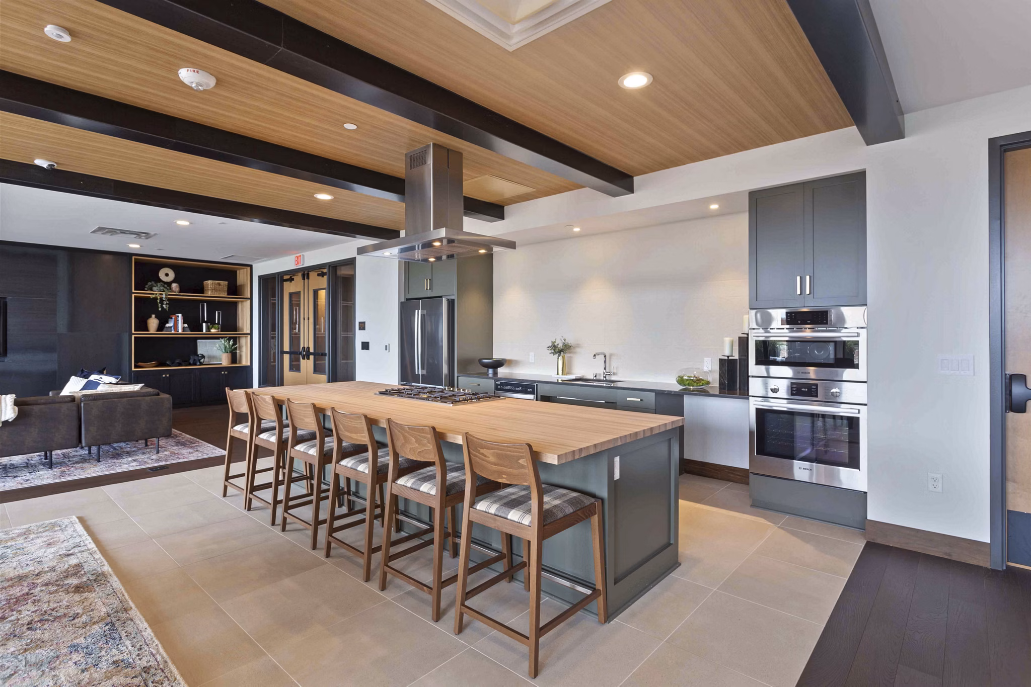 Elegant clubhouse featuring modern design and cozy seating at The Berkman Apartments