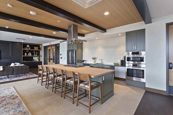 Elegant clubhouse featuring modern design and cozy seating at The Berkman Apartments