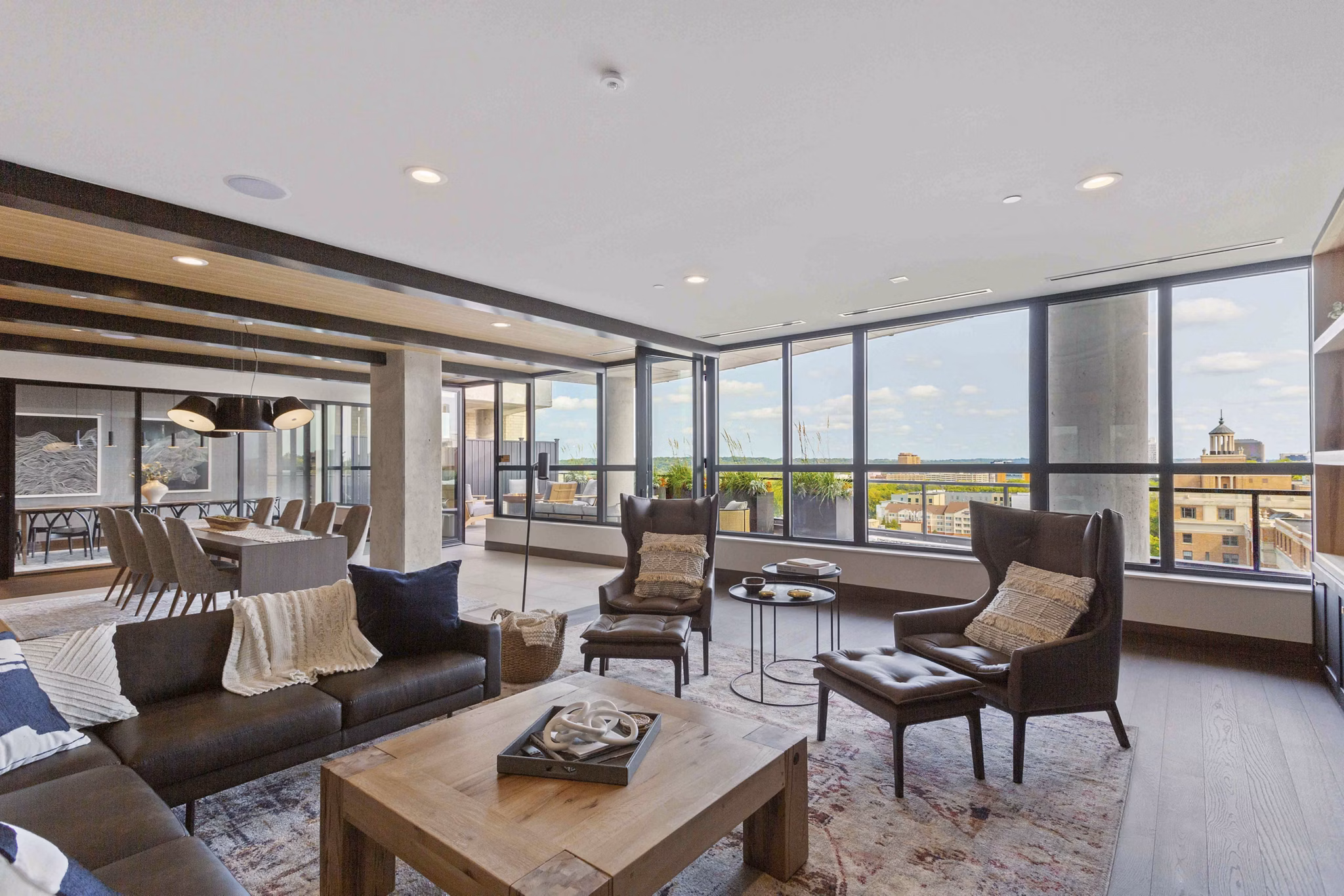 Clubhouse with luxurious seating and communal spaces at The Berkman Apartments