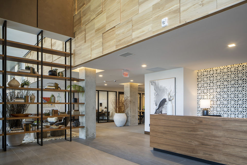 Elegant clubhouse at The Berkman Apartments featuring modern design and luxurious amenities in downtown Rochester