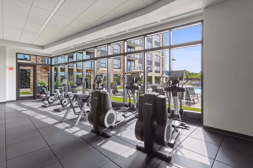 Modern fitness center with state-of-the-art equipment at The Berkman Apartments, ideal for active residents seeking a luxury lifestyle