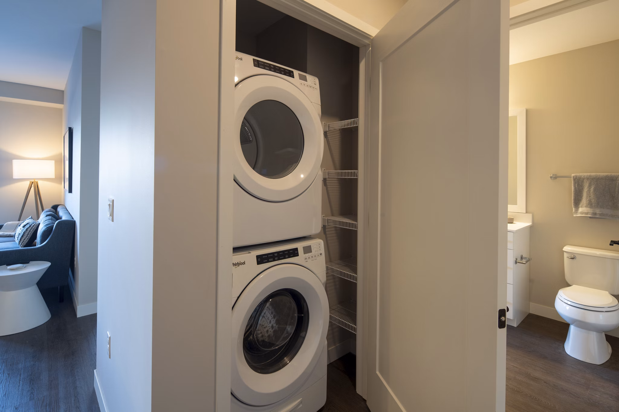 Laundry room with high-efficiency machines at The Berkman Apartments in Rochester