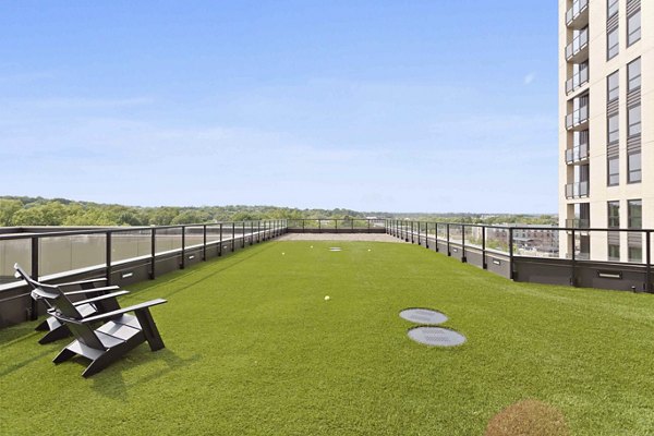 Outdoor sport court with basketball hoops at The Berkman Apartments; perfect for active residents
