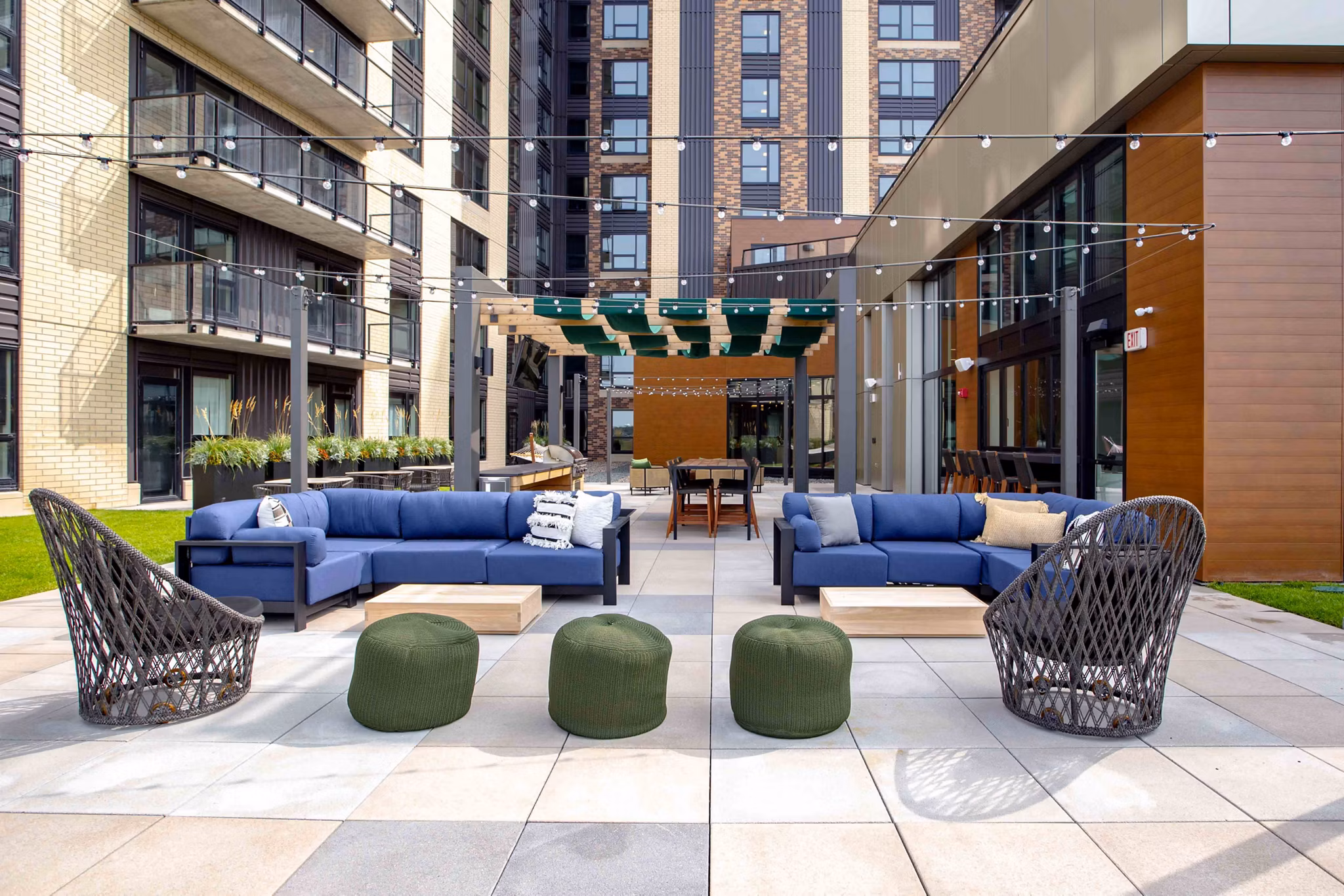 Courtyard with seating and garden at The Berkman Apartments, a luxury community