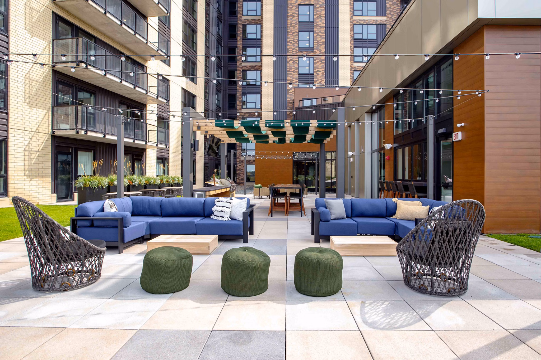 Courtyard with seating and garden at The Berkman Apartments, a luxury community