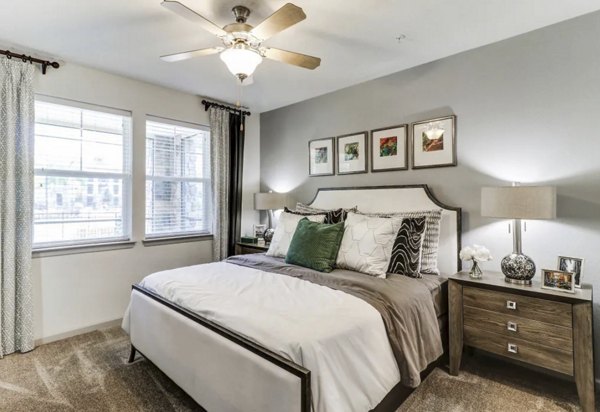 Luxury bedroom with contemporary furnishings at Venetian Isle Apartments
